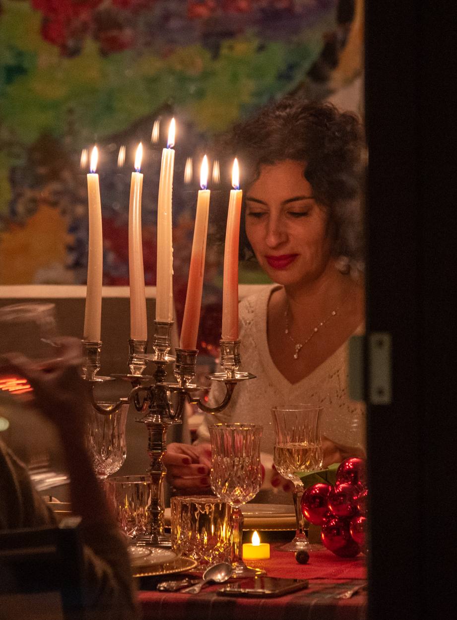 Woman by candlelight
